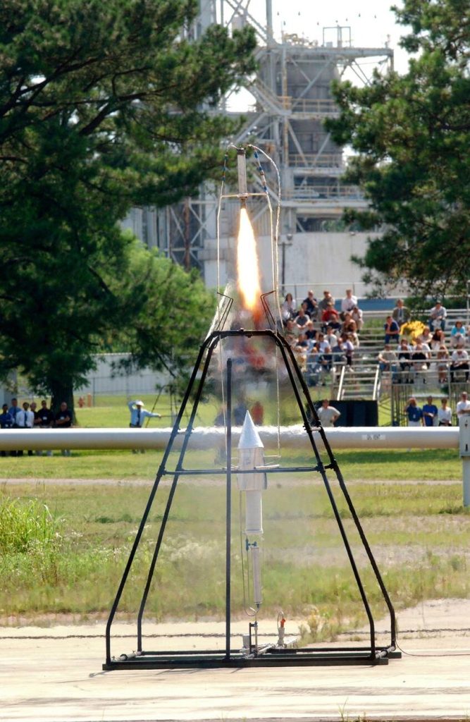 Why do model rockets spin?